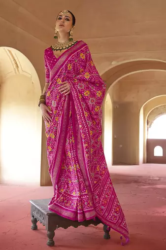 Hot pink poly viscose silk patola printed saree with heavy dimond swarovski work border