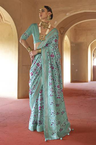 Turquoise poly viscose silk patola printed saree with heavy dimond swarovski work border