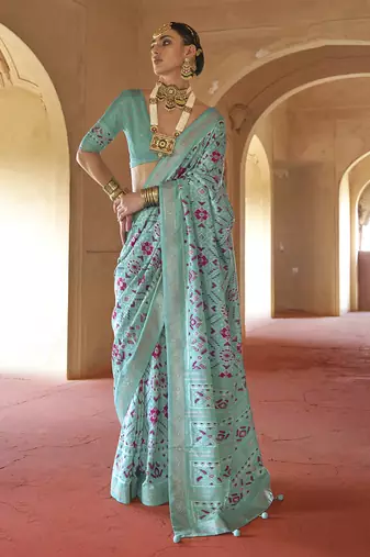 Turquoise poly viscose silk patola printed saree with heavy dimond swarovski work border