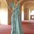 Turquoise poly viscose silk patola printed saree with heavy dimond swarovski work border