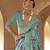 Turquoise poly viscose silk patola printed saree with heavy dimond swarovski work border