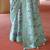 Turquoise poly viscose silk patola printed saree with heavy dimond swarovski work border