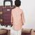 Onion pink kurta with aeroplanes/clouds hand embroidered bundi jacket with pajama set
