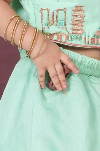 Mint green travel theme hand embroidered blouse with double layer ghagara set