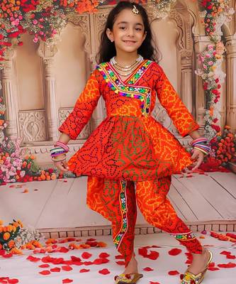 Orange printed cotton kurti with dhoti set for girls 1