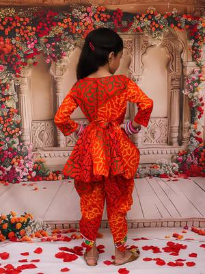 Orange printed cotton kurti with dhoti set for girls 2