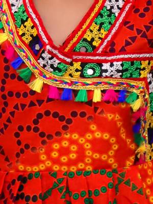 Orange printed cotton kurti with dhoti set for girls 4