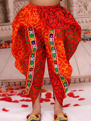 Orange printed cotton kurti with dhoti set for girls 5