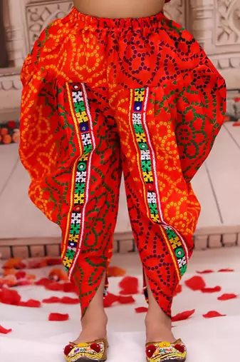 Orange printed cotton kurti with dhoti set for girls