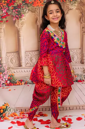 Pink printed cotton kurti with dhoti set for girls