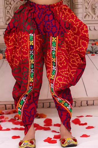 Pink printed cotton kurti with dhoti set for girls