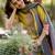 yellow colored party wear embroidered stitched crepe pant style kurti suit with duppatta