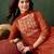 orange colored party wear embroidered stitched georgette pant style kurti suit with duppatta