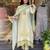 off white colored party wear embroidered stitched linen silk pant style kurti suit with duppatta
