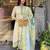 off white colored party wear embroidered stitched linen silk pant style kurti suit with duppatta