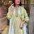 off white colored party wear embroidered stitched linen silk pant style kurti suit with duppatta