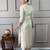 off white colored party wear embroidered stitched chanderi silk pant style kurti suit with duppatta