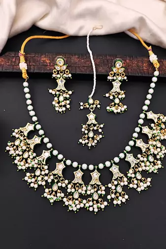 Beautiful kundan pearl and green pearls necklace set with maang tikka & earrings