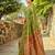 Light green woven paithani silk blend saree with unstitched blouse