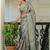 Green silk zari screen printed woven floral print striped woven zari work party ready to wear saree with blouse