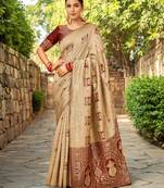 Beige paithani silk blend saree with intricate hand woven and unstitched blouse