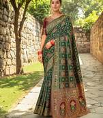 Green paithani silk blend saree with intricate hand woven and unstitched blouse