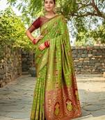 Light green paithani silk blend saree with intricate hand woven and unstitched blouse