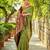 Light green paithani silk blend saree with intricate hand woven and unstitched blouse