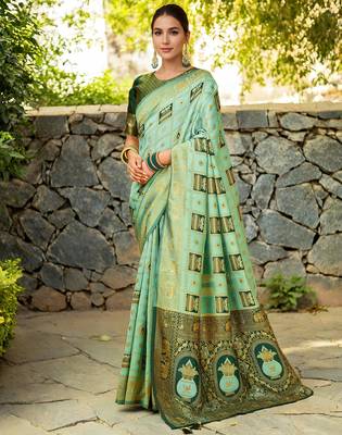 Mint green paithani silk blend saree with intricate hand woven and unstitched blouse 1