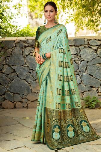 Mint green paithani silk blend saree with intricate hand woven and unstitched blouse