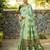 Mint green paithani silk blend saree with intricate hand woven and unstitched blouse