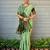 Mint green paithani silk blend saree with intricate hand woven and unstitched blouse
