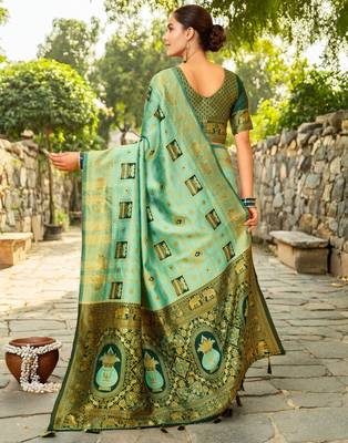Mint green paithani silk blend saree with intricate hand woven and unstitched blouse 4