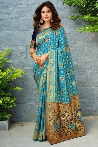 Rama paithani silk blend saree with intricate hand woven and unstitched blouse