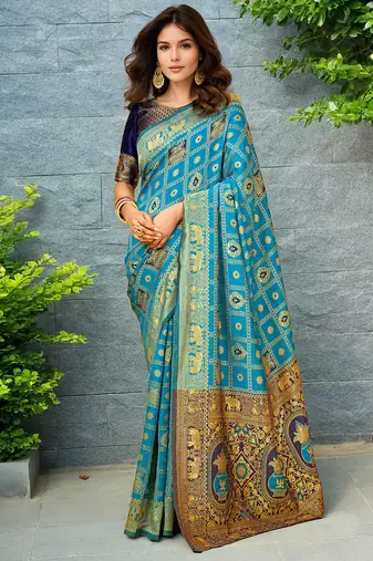 Rama paithani silk blend saree with intricate hand woven and unstitched blouse