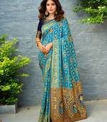 Rama paithani silk blend saree with intricate hand woven and unstitched blouse