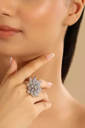 Rhodium plated floret swirl adjustable ring