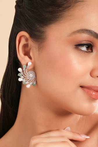 Rhodium plated pearl mystic flare stud earrings