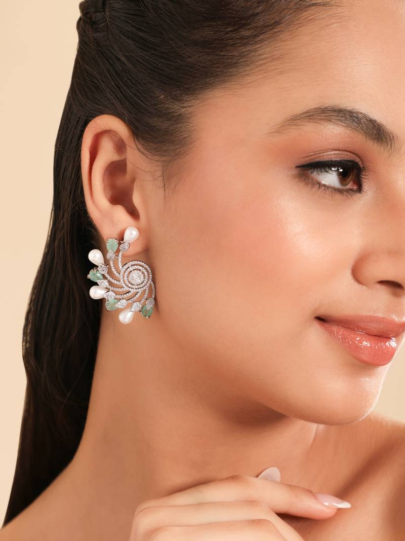 Rhodium plated pearl mystic flare stud earrings