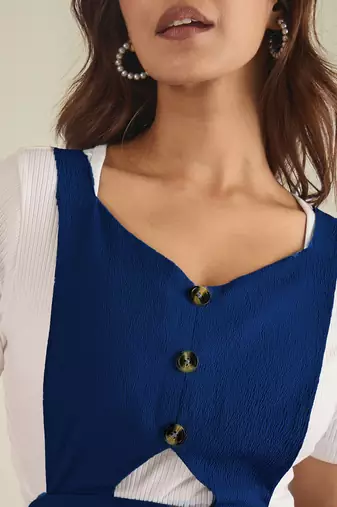 women blue solid pinafore dress with button