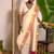 off white mul cotton handwoven saree with golden and pink border