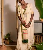 off white handwoven mul cotton saree with green and zari border