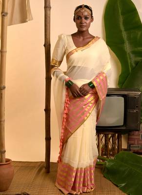 cream white cotton saree with pink and golden striped border 1
