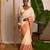 cream white cotton saree with pink and golden striped border
