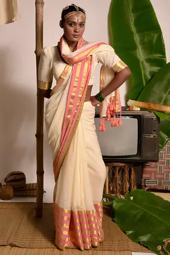 cream white cotton saree with pink and golden striped border