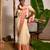 cream white cotton saree with pink and golden striped border