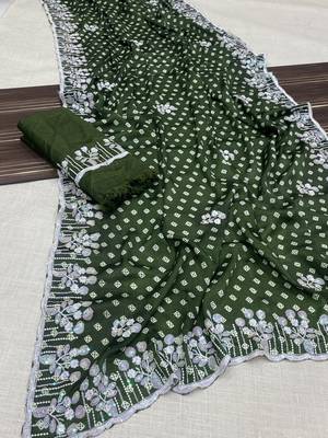 chinon silk bandhani print pallu sequin and thread work green saree 1