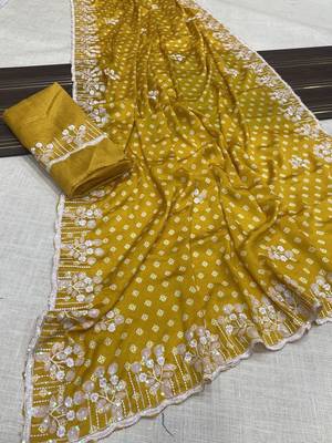 chinon silk bandhani print pallu sequin and thread work yellow saree 1