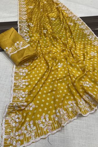 chinon silk bandhani print pallu sequin and thread work yellow saree