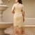 Elegant beige salwar suit with floral embroidery, palm tree print, three-quarter sleeves